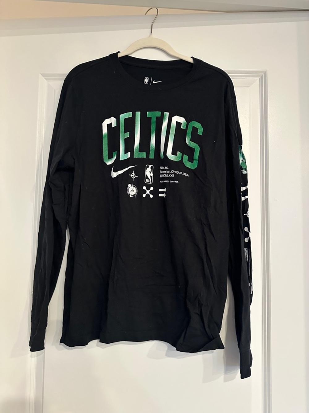Nike Black Long Sleeve Celtics Tee with Green and White Graphics